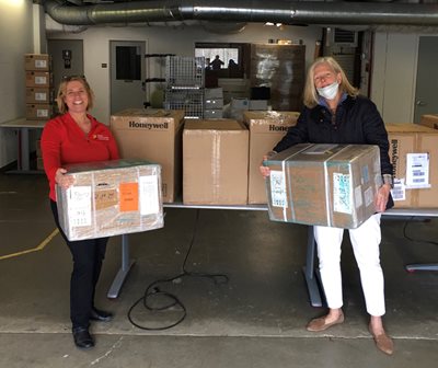 Pictured L-R: Catherine McCarthy, director of corporate health for Morristown Medical Center and Bonnie Gannon, director of corporate and foundation relations for the Foundation for Morristown Medical Center accepting PPE donations from Emerson Automation Solutions. 