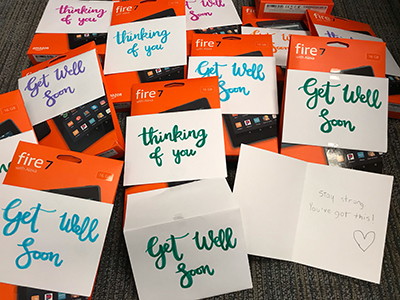 20 Amazon Fire 7 tablets with words of encouragement for patients in isolation donated by Nick Mulvihill.